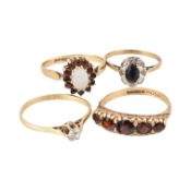 FOUR HALLMARKED 9CT GOLD RING