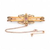 HALLMARKED EARLY 20TH CENTURY 15CT GOLD RUBY & DIAMOND BROOCH