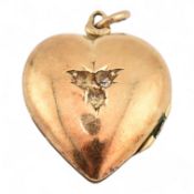 EARLY 20TH CENTURY 18CT GOLD HEART PENDANT LOCKET