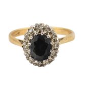18CT GOLD SAPPHIRE & DIAMOND HALO RING