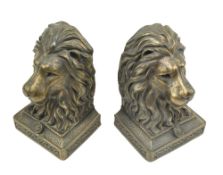 PAIR OF BRONZED EFFECT RESIN LION'S HEAD BOOKENDS