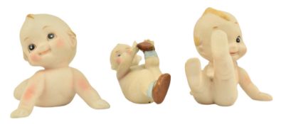 ROSE O NEILL - THREE EARLY 20TH CENTURY BISQUE PORCELAIN KEWPIE DOLLS