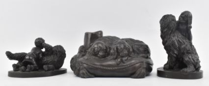 MANNER OF CHARLES VALTON - BRONZED RESIN FIGURE OF KING CHARLES SPANIEL DOGS T/W TWO OTHERS