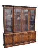 GEORGE III REVIVAL FLAME MAHOGANY BREAKFRONT LIBRARY BOOKCASE