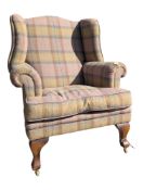 EARLY 20TH CENTURY PLAID UPHOLSTERED WINGBACK ARMCHAIR