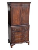 GEORGE III STYLE SERPENTINE FRONT MAHOGANY CHEST ON CHEST CABINET