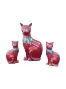 POOLE POTTERY - THREE VINTAGE 1960S FLAMBE DELPHIS CAT FIGURES