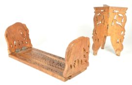 20TH CENTURY WOODEN CARVED INDIAN BOOKSLIDE AND TABLE LEGS