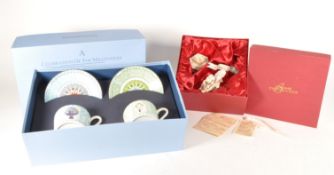 TWO 2000 MILLENNIUM BOXED PORCELAIN AND CHINA SETS