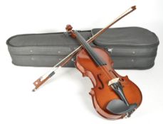 20TH CENTURY 1/4 SIZE VIOLIN IN CASE WITH BOW