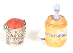 EARLY 20TH CENTURY TAPE MEASURE & PIN CUSHION