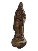 EARLY 20TH CENTURY TIBETAN BRONZE PRIEST FIGURE