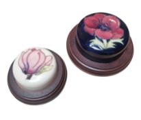 MOORCROFT - TWO 20TH CENTURY CERAMIC AND WOODEN PAPERWEIGHTS