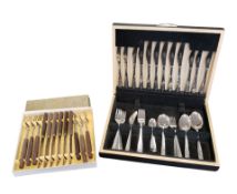 TWO VINTAGE LATE 20TH CENTURY BOXED STAINLESS STEEL CUTLERY SETS