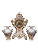 20TH CENTURY PORCELAIN GERMAN MANTEL CLOCK WITH TWO AUSTRIAN URNS