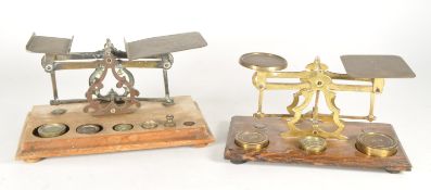 TWO PAIRS OF VICTORIAN MAHOGANY AND BRASS POSTAL SCALES