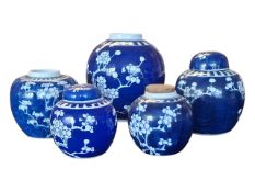 FIVE 20TH CENTURY CHINESE PRUNUS GINGER JARS