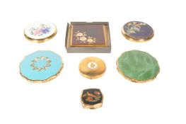 A COLLECTION OF SEVEN MID TO LATE CENTURY COMPACTS