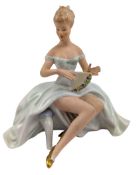 WALLENDORF - 1920S ART DECO PORCELAIN CABINET FIGURINE OF A SEATED LADY WITH FAN