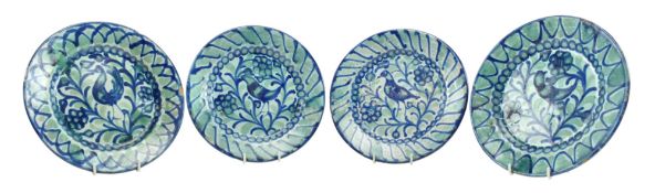 FAJALAUZA, GRANADA - FOUR SPANISH 19TH CENTURY TIN GLAZED PLATES