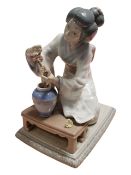 LLADRO - 20TH CENTURY JAPANESE GIRL DECORATING FIGURE