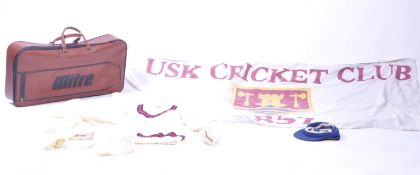 20TH CENTURY MITRE LEATHER BAG WITH USK CRICKET CLUB FLAG & UNIFORM