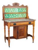EDWARDIAN WALNUT MARBLE AND TILE BACK WASHSTAND