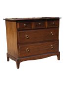 STAG FURNITURE - A STAG MAHOGANY MINSTREL CHEST OF DRAWERS