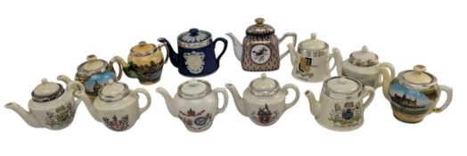 COLLECTION OF TWELVE CERAMIC MINIATURE TEAPOTS