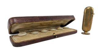 CASED SET OF SIX MOTHER OF PEARL BUTTONS & A MATCH STRIKER