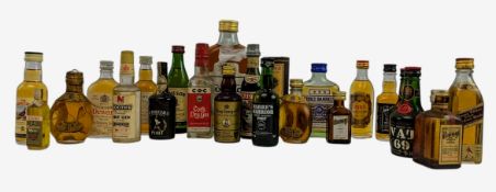 CIRCA 23 VINTAGE & LATER MINIATURE BOTTLES OF WHISKIES AND SPIRITS