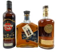 THREE AGED DARK RUM BOTTLES, FLOR DE CANA, BACARDI GRAN RESERVA & HAVAN CLUB
