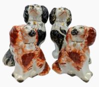 FOUR STAFFORDSHIRE POTTERY 19TH CENTURY SPANIEL DOG FIGURES