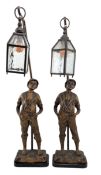 MATCHED PAIR OF EARLY 20TH CENTURY BRONZED EFFECT WHISTLING BOY/SAILOR LAMPS