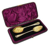 CASED PAIR OF GEORGE III HALLMARKED SILVER GILT BERRY SPOONS