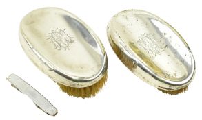 PAIR OF 20TH CENTURY HALLMARKED SILVER CLOTH BRUSHES