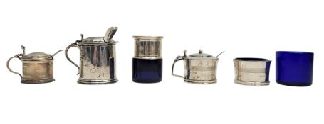 COLLECTION OF FIVE 20TH CENTURY HALLMARKED SILVER & BLUE GLASS CONDIMENT POTS
