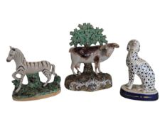 THREE 19TH CENTURY STAFFORDSHIRE PORCELAIN ANIMAL FIGURES