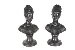 PAIR OF 20TH CENTURY BLACK CHALKWARE BUSTS