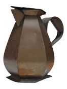 LATE 19TH CENTURY BRASS ARTS & CRAFTS CRESTED WATER JUG
