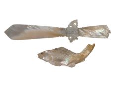 20TH CENTURY MOTHER OF PEARL LETTER OPENER AND FISH PAPERWEIGHT