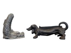 20TH CENTURY CAST IRON DOG BOOT SCRAPER AND SPELTER POND SPITTER