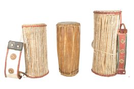 THREE 20TH CENTURY NIGERIAN DRUMS