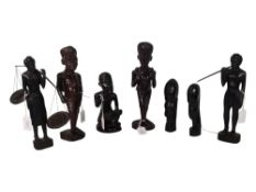 COLLECTION OF SEVEN HAND CARVED MID CENTURY AFRICAN FIGURES & BUSTS