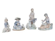 LLADRO - FOUR LATE 20TH CENTURY PORCELAIN FIGURINES