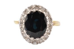 18CT GOLD SAPPHIRE & DIAMOND CLUSTER RING