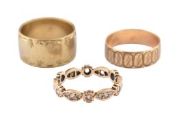 THREE 9CT GOLD BAND RINGS