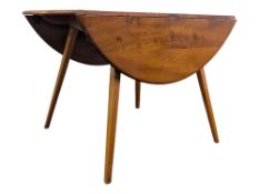 ERCOL FURNITURE - A MID CENTURY BEECH & ELM MODEL 384 DROP LEAF DINING TABLE
