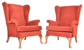 PARKER KNOLL - PAIR OF MID CENTURY RED WINGBACK ARMCHAIRS