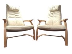 PAIR OF CONTEMPORARY CANTILEVER DESIGNER LEATHER ARMCHAIRS